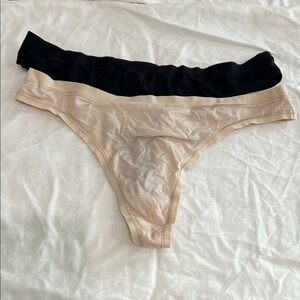 NWT - Two Victoria's Secret Black and Nude Thongs